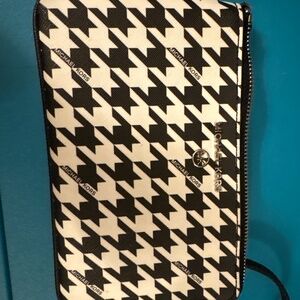 Michael Kors black and white checkered wristlet